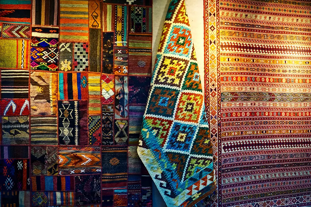 Handwoven kilim rugs in a Moroccan souk